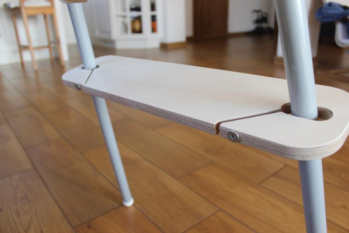 ikea antilop söögitooli valgelamineeritud vineerist jalatugi